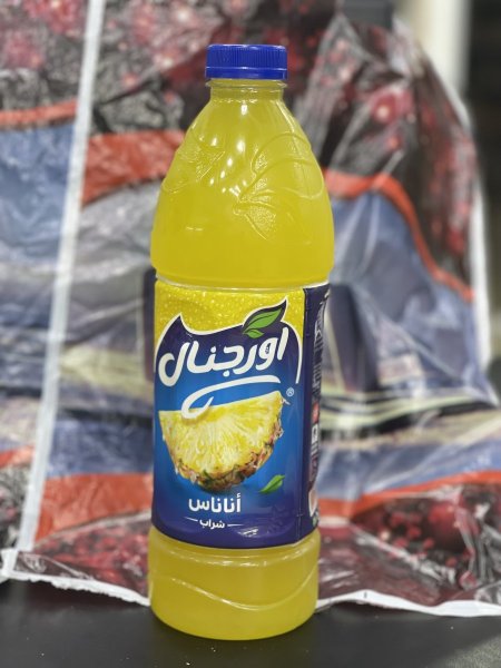 عصير اورجنال بطعم الاناناس