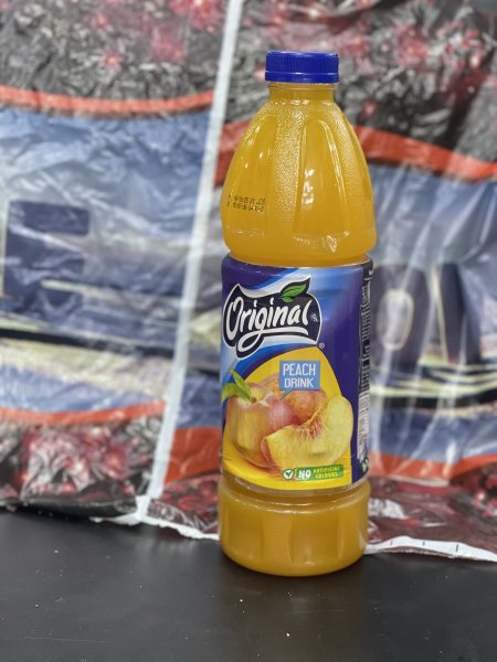مشروب اورجنال بطعم الخوخ